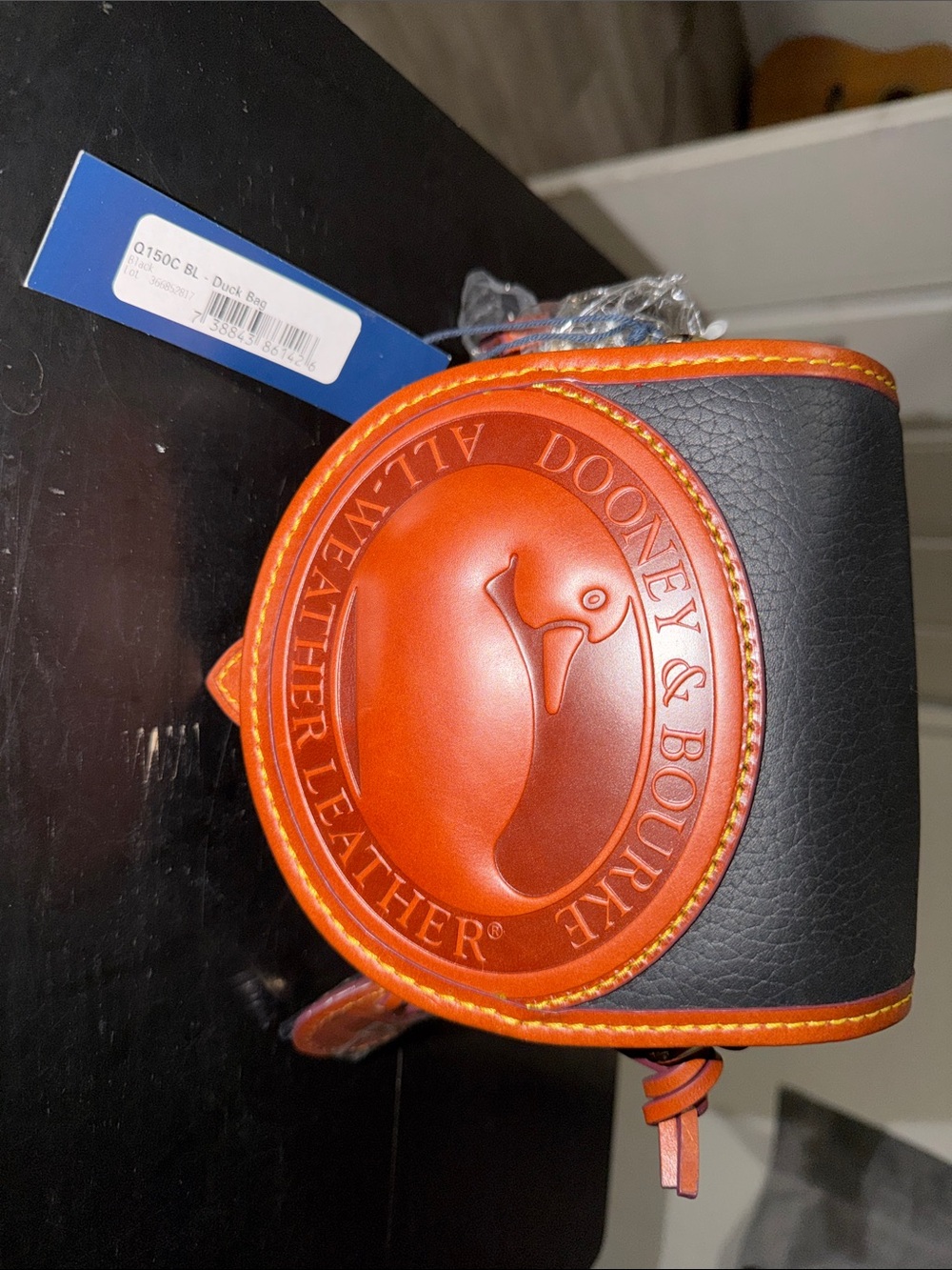 Dooney & Bourke Black and Orange Leather Crossbody Pouch